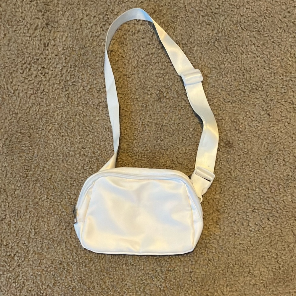 Compact White Crossbody Bag with Adjustable Strap
